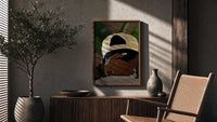 Backwards Cap with an Embracing Hand poster framed above a fluted sideboard beside a potted tree