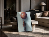 Basketball Balanced on a Fingertip print on the floor, leaning against a travertine table