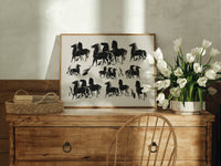 Group of black horses print in an oak frame on a farmhouse dresser beside white tulips