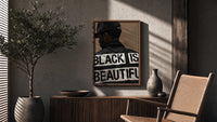 Black Is Beautiful Cap poster framed above a fluted sideboard beside a potted tree