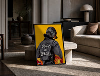 Black Is Beautiful Flame Jacket print on the floor, leaning against a travertine table