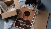 Black Is Beautiful Jacket framed print being unpacked from protective bubble wrap and a box