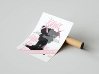 Black KAWS Companion hunched in a see-no-evil pose over layered pink script text, shown with a shipping tube