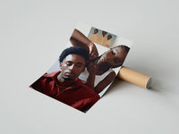 Gently curled Black Man Having His Hair Braided print beside its protective shipping tube