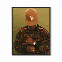 Framed Black Man in Brown Baseball Cap print shown as a bold statement piece on a clean gallery wall