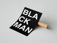 Gently curled Black Man Lettering print beside its protective shipping tube
