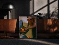 Black-framed Black Man Playing a Vinyl Record print on the floor in front of a dark wooden console