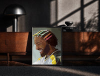 Black-framed Black Man with Colorful Hair Clips print on the floor in front of a dark wooden console