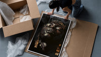 Black Man with Gold Drop Earrings framed print being unpacked from protective bubble wrap and a box