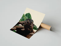 Gently curled Black Man with Hand on Head print beside its protective shipping tube