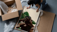 Black Man with Hand on Head framed print being unpacked from protective bubble wrap and a box