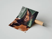 Black Woman with Tropical Leaves print gently curled beside its protective shipping tube