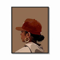 Framed Black Woman in Red Baseball Cap print shown as a bold statement piece on a clean gallery wall