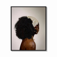 Framed Black Woman with a Curly Puff print shown as a bold statement piece on a clean gallery wall