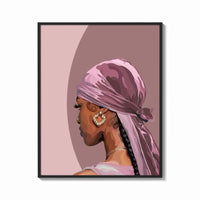 Framed Black Woman with a Pink Headscarf print shown as a bold statement piece on a clean gallery wall