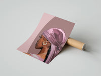 Gently curled Black Woman with a Pink Headscarf print beside its protective shipping tube