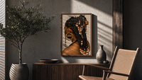 Black Woman with Beaded Braids poster framed above a fluted sideboard beside a potted tree