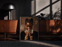 Black-framed Black Woman with Clasped Hands print on the floor in front of a dark wooden console