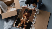 Black Woman with Clasped Hands framed print being unpacked from protective bubble wrap and a box