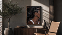 Black Woman with Cornrow Braids poster framed above a fluted sideboard beside a potted tree