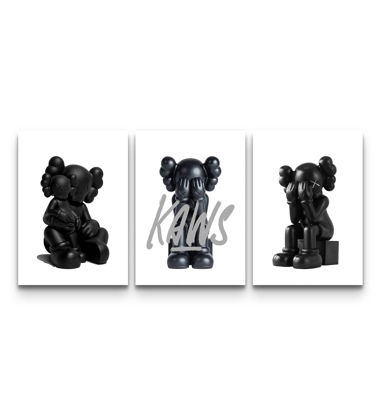 Three-panel Blackout XX KAWS set with all-black matte figures and bold XX eyes on white