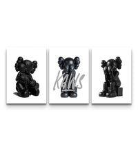 Three-panel Blackout XX KAWS set with all-black matte figures and bold XX eyes on white