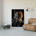 Orange-haired man with cracked skull mask poster framed in a luxury living-room setting