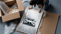 BMW M3 GT Race framed print being unboxed from protective packaging