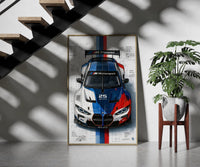 BMW M4 GT3 M Power framed print on a staircase entryway wall beside a plant