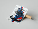 BMW M4 GT3 M Power poster print laid beside its crush-resistant shipping tube
