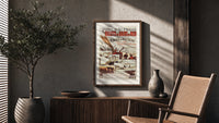 Breton fishing boat and coastal scenes poster framed above a fluted sideboard beside an olive tree