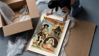 Breton bagpiper and young woman framed print being unpacked from protective bubble wrap and a box