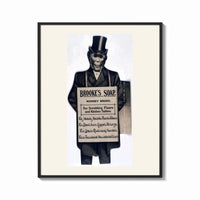 Framed Monkey in top hat and suit print shown as a bold statement piece on a clean gallery wall