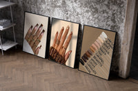 Brown Manicures and Swatches Set of 3 as black-framed prints leaning against a raw-plaster wall