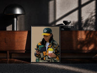 Black-framed Camo Jacket and Takeaway Drink print on the floor in front of a dark wooden console