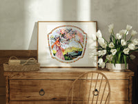 Elegant woman under blossoming tree print in an oak frame on a farmhouse dresser beside white tulips