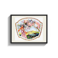Framed Elegant woman under blossoming tree print shown as a wide statement piece on a clean white wall
