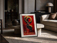 Woman dancing with champagne bottle print in a black frame leaning on a travertine table in a sunlit lounge