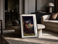Man in red cloak holding lantern print in a black frame leaning on a travertine table in a sunlit lounge
