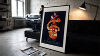 Clown wrapped in orange peel print in a slim black frame leaning on a dark sofa in a concrete print studio