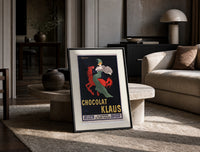 Woman in green riding red horse print in a black frame leaning on a travertine table in a sunlit lounge