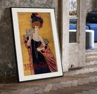 Elegant woman in evening gown print in a black frame leaning beside a vintage door on parquet