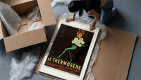 Fire-breathing man clutching cotton wool framed print being unpacked from protective bubble wrap and a box