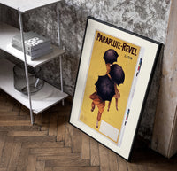 People walking with black umbrellas poster in a black frame leaning beside a shelf in a raw-plaster loft