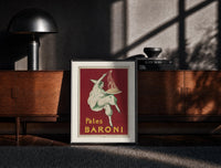 Black-framed Pierrot serving plate of spaghetti print on a moody console with designer coffee-table books