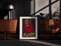 Black-framed Bearded man with fur hat print on a moody console with designer coffee-table books
