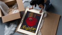 Bearded man with fur hat framed print being unpacked from protective bubble wrap and a box