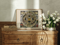 Copernican solar system celestial map print in an oak frame on a farmhouse dresser beside white tulips