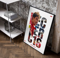 Charles Leclerc F1 driver portrait poster in a black frame leaning beside a shelf in a raw-plaster loft