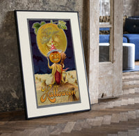 Pumpkin-headed figure with harvest moon print in a black frame leaning beside a vintage door on parquet